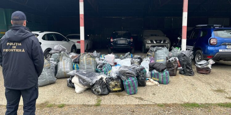 Autoutilitară transformată în magazin ambulant! 350 de articole vestimentare confiscate la Racovăț